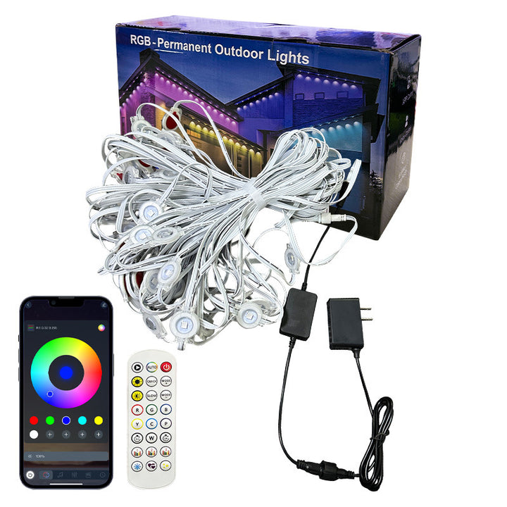 Kolorowe lampki LED pod okapem domu