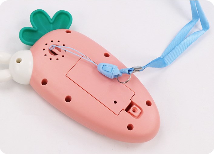 Telefon zabawka w kształcie marchewki