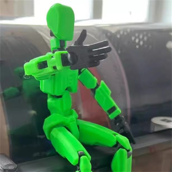 Pomarańczowy ruchomy robot z druku 3D