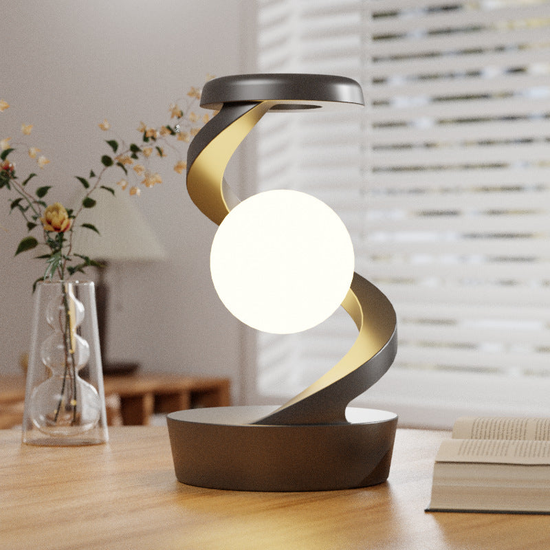 Lampka z obrotową świecącą kulą księżyca