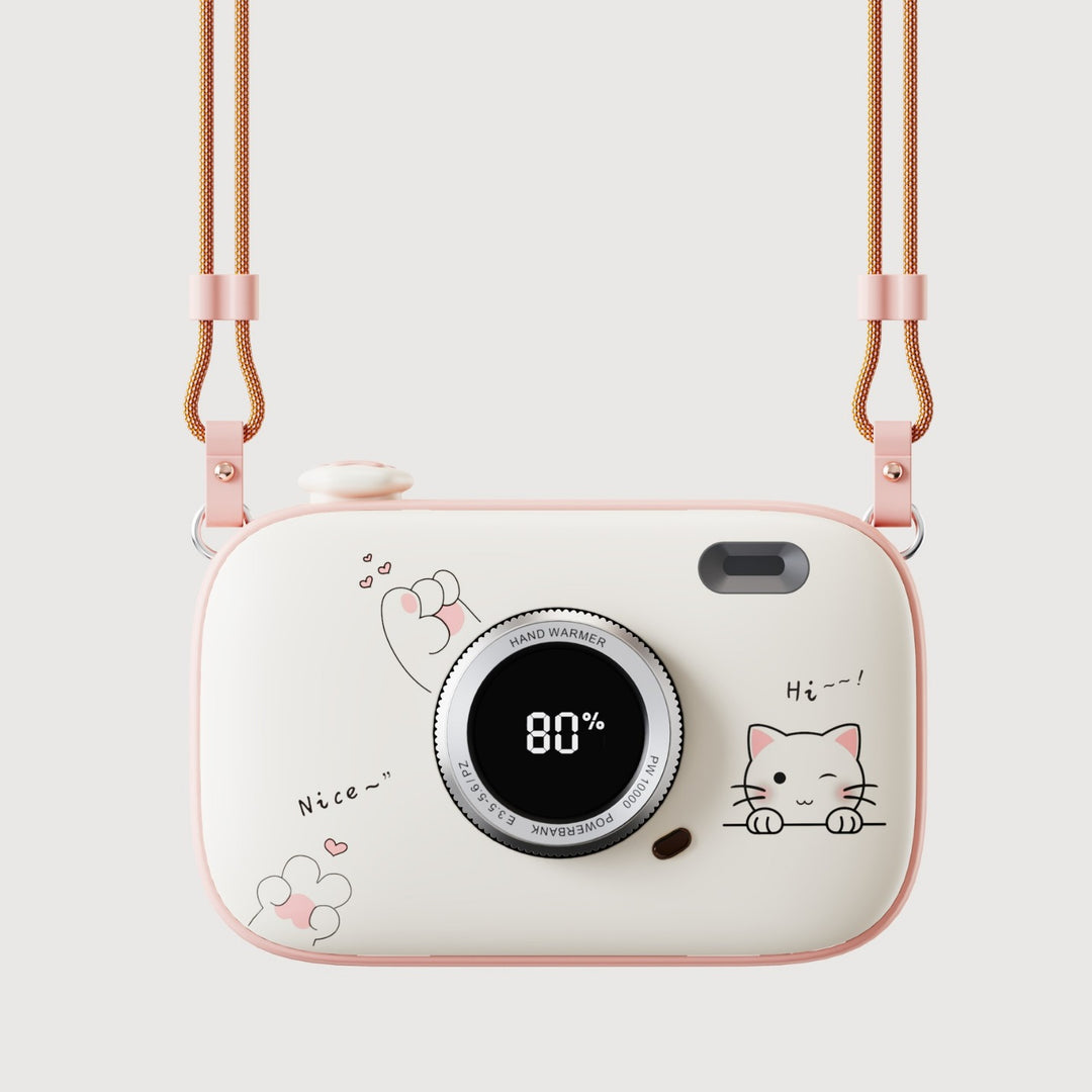 Różowy ogrzewacz do rąk w kształcie aparatu