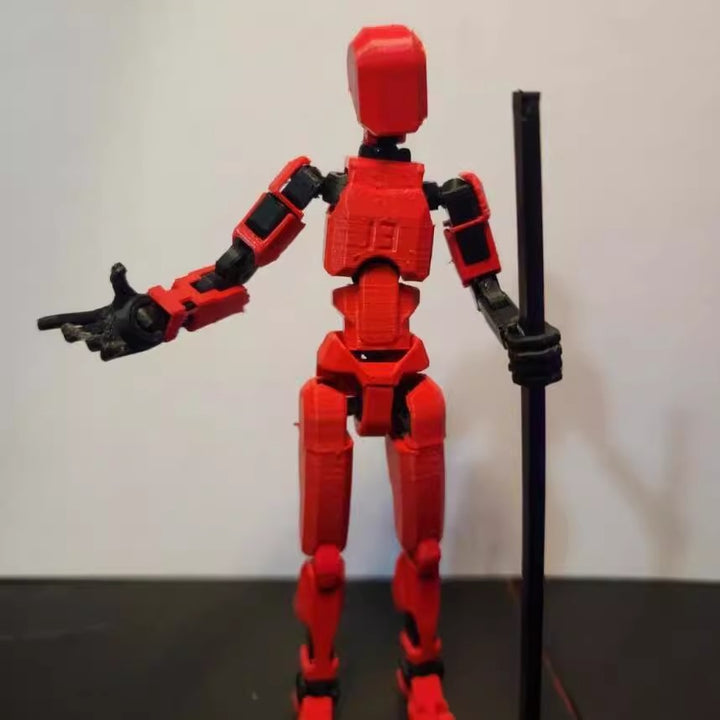 Pomarańczowy ruchomy robot z druku 3D